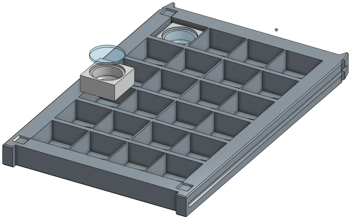2D arena with 24 removable wells, two of them shown lifted out with a coverslip