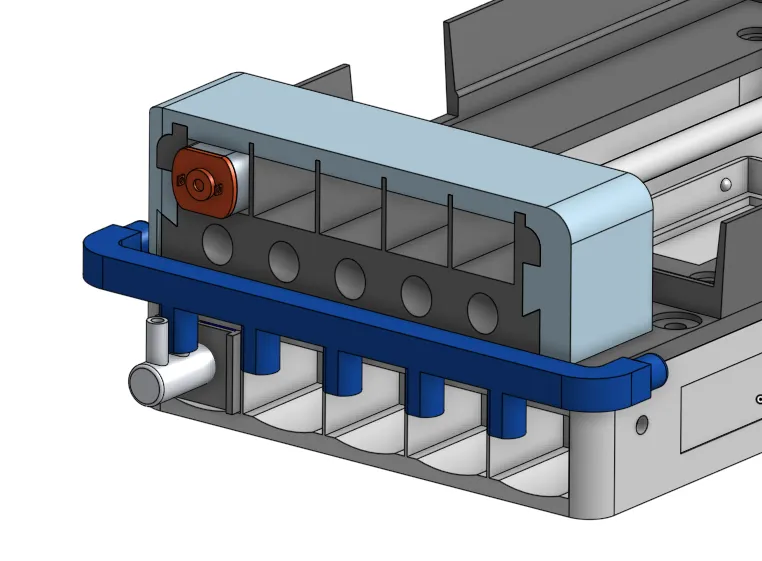 Render of the valve base with the input pipe adaptor, in blue, under the row of valves